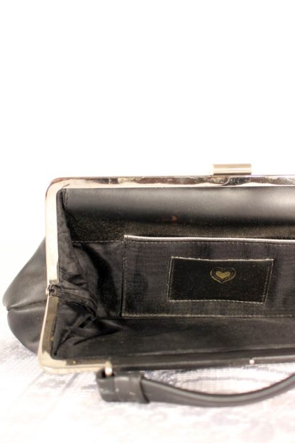 vintage-handtasche-silber-verschluss