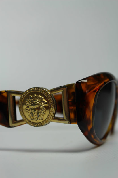 Sonnenbrille mit Löwen Emblem